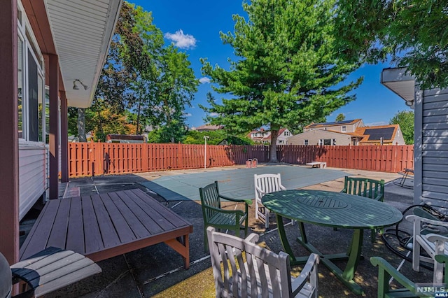 wooden deck featuring a patio area