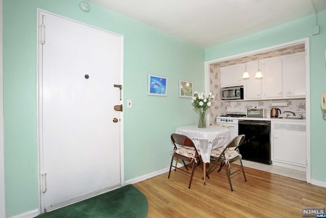 dining area featuring light hardwood / wood-style floors