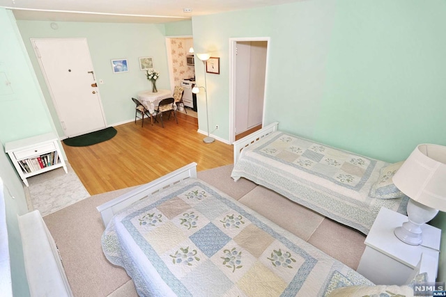 bedroom featuring hardwood / wood-style flooring