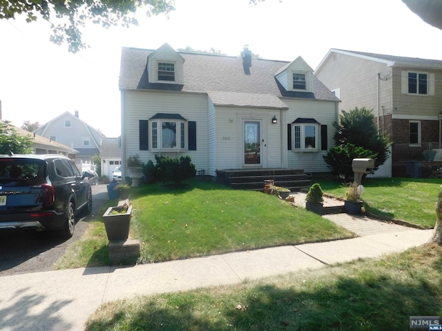 view of front of home featuring a front lawn