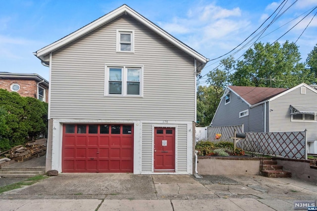 front facade with a garage