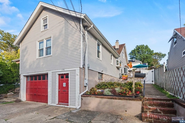 view of home's exterior featuring a garage