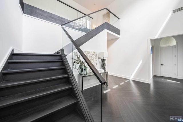 stairs with parquet flooring