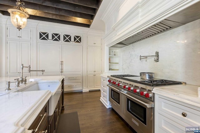 kitchen with white cabinetry, dark wood-type flooring, and double oven range