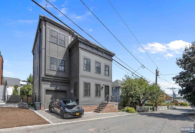 view of front of home featuring a garage