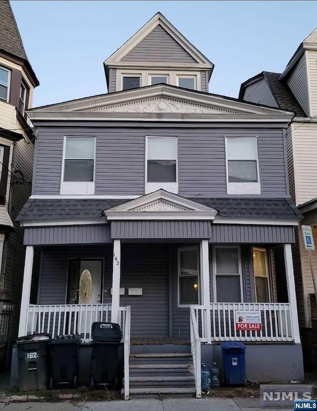 view of front of house featuring covered porch