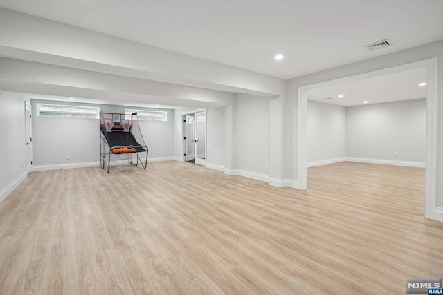 basement with light wood-type flooring