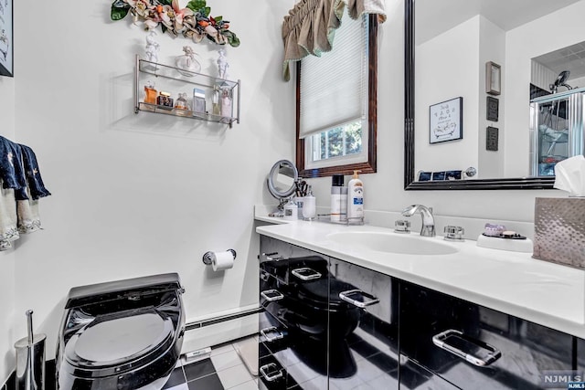 bathroom with vanity, a shower with door, tile patterned flooring, toilet, and baseboard heating