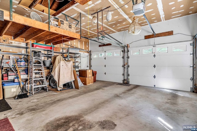 garage featuring a garage door opener