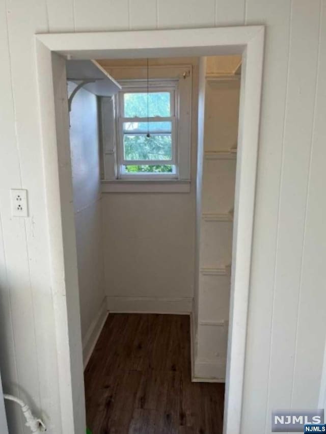 hall featuring dark hardwood / wood-style flooring