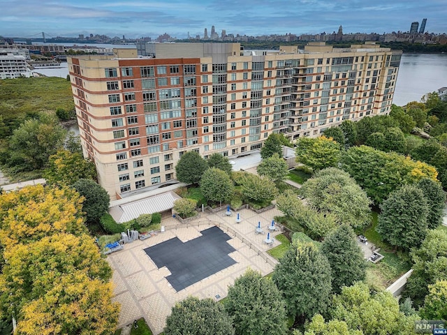 view of building exterior with a water view