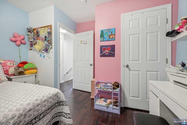 bedroom featuring dark hardwood / wood-style floors