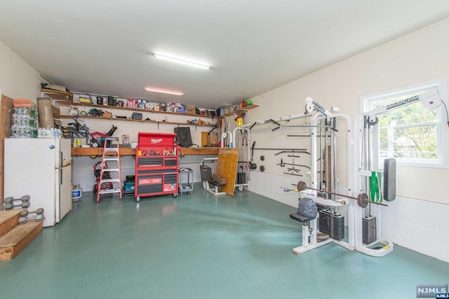 garage with white refrigerator