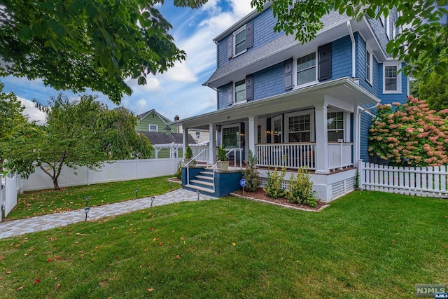 view of front of house featuring a porch and a front lawn