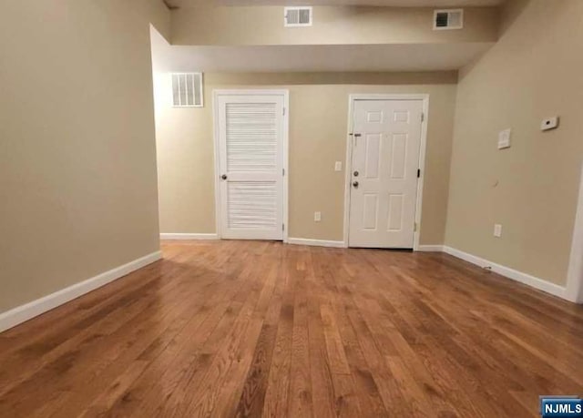 foyer entrance featuring hardwood / wood-style flooring