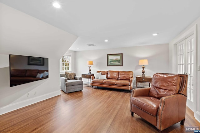 living room featuring light wood-type flooring