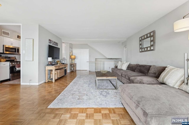 living room with parquet floors