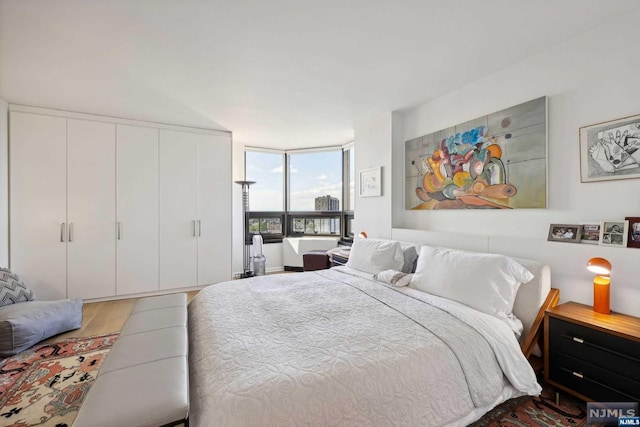 bedroom with expansive windows