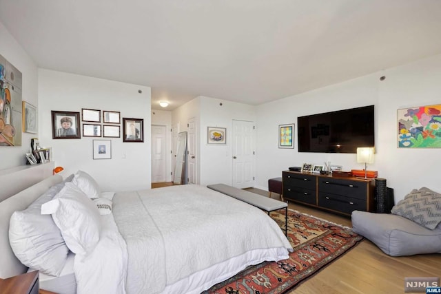 bedroom featuring hardwood / wood-style flooring