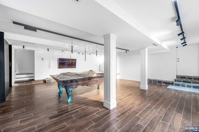 rec room with dark hardwood / wood-style flooring, track lighting, and billiards