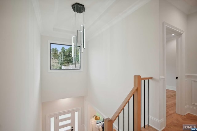 room details featuring ornamental molding and parquet flooring