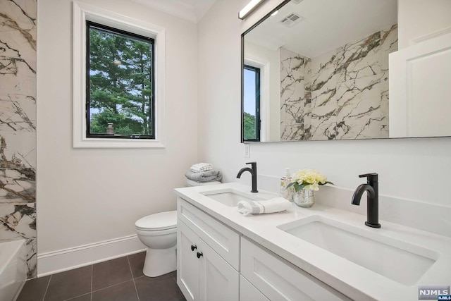 full bathroom with tile patterned flooring, vanity, toilet, and shower / washtub combination