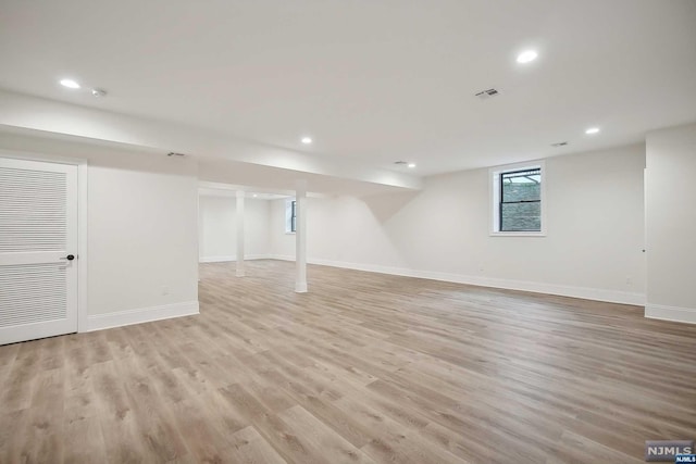 basement with light wood-type flooring