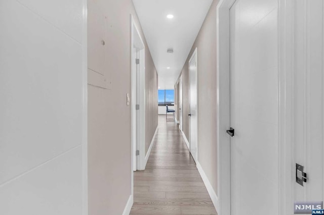 hall featuring light hardwood / wood-style flooring