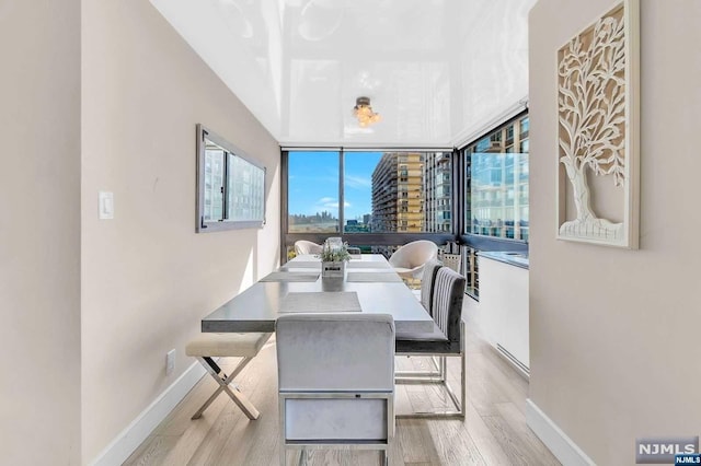 dining area featuring light hardwood / wood-style floors