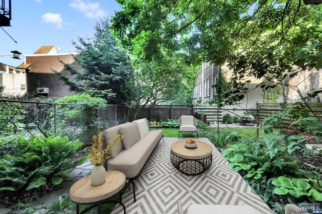 view of patio / terrace featuring an outdoor living space