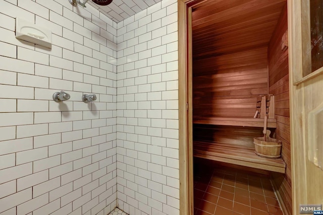 view of sauna featuring tile patterned floors