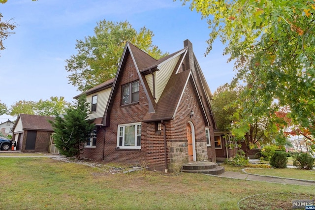 view of property exterior featuring a lawn