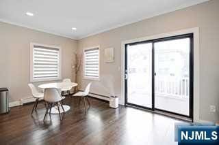 living area featuring dark hardwood / wood-style floors