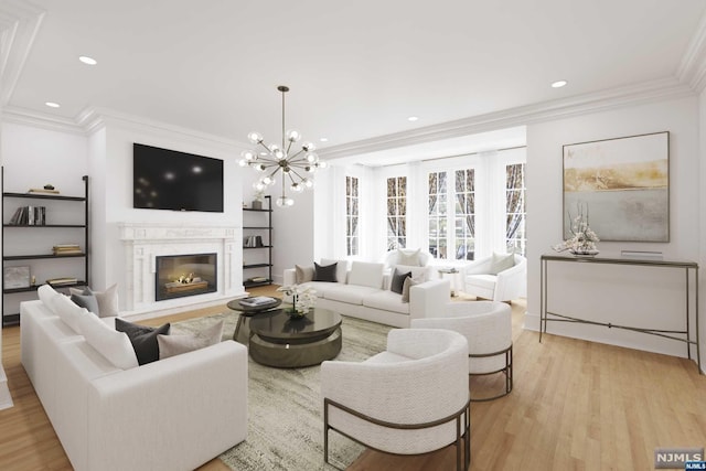 living room featuring a notable chandelier, a premium fireplace, crown molding, and light hardwood / wood-style flooring