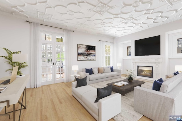 living room featuring hardwood / wood-style floors and french doors