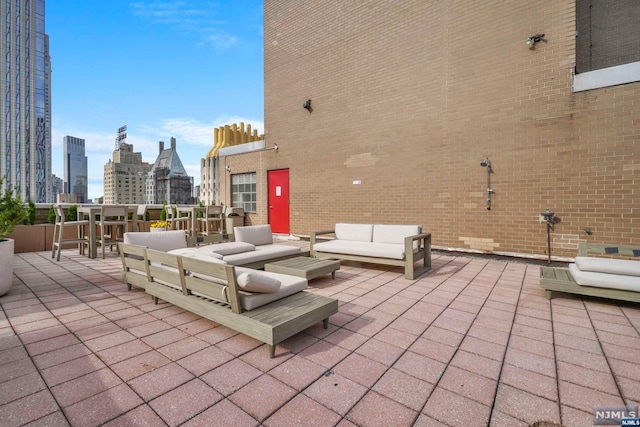 view of patio with an outdoor hangout area