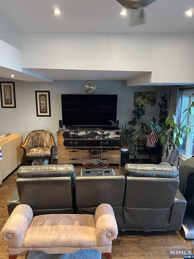 living room featuring dark wood-type flooring