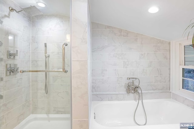 bathroom with lofted ceiling