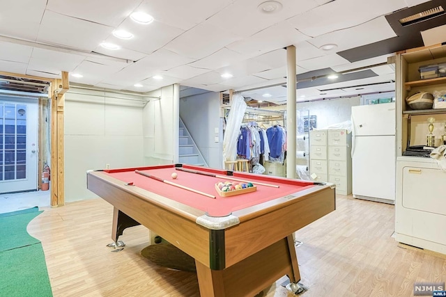 game room featuring washer / dryer, billiards, and light hardwood / wood-style flooring