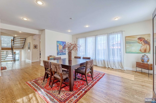 dining room featuring light wood-type flooring