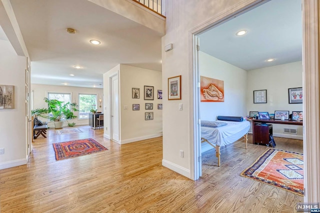 hall featuring light hardwood / wood-style flooring