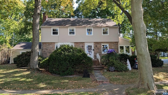 view of front of home with a front yard