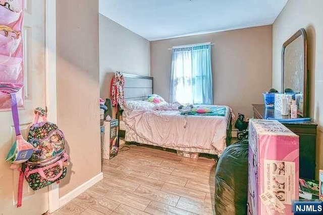 bedroom featuring light hardwood / wood-style flooring