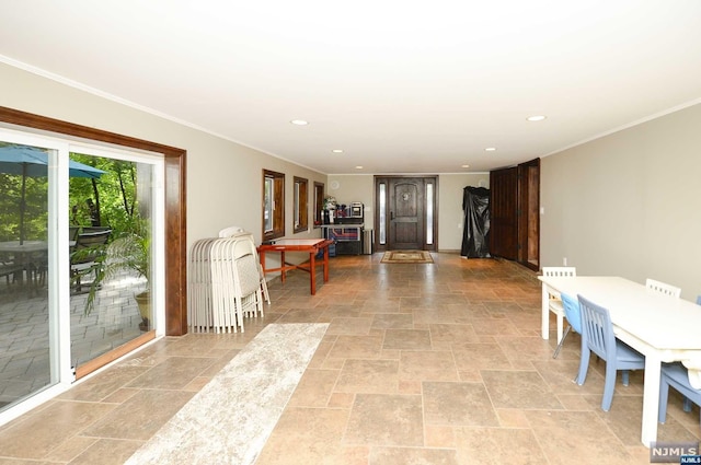 interior space with crown molding