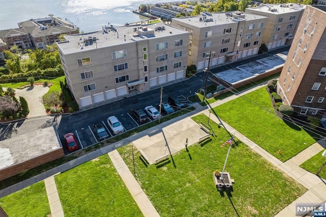 bird's eye view with a water view