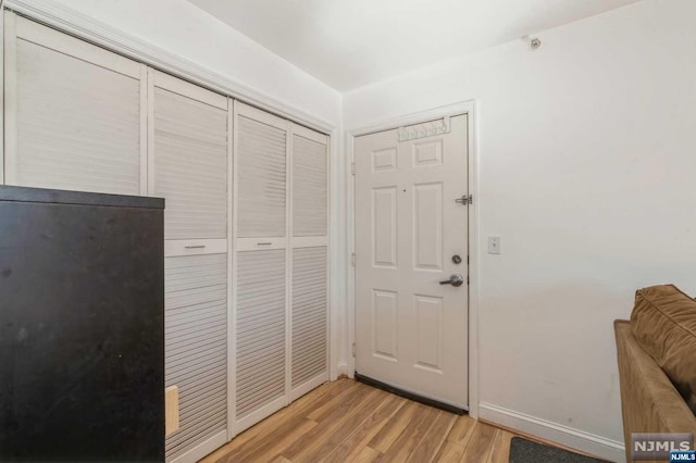 foyer featuring light hardwood / wood-style flooring