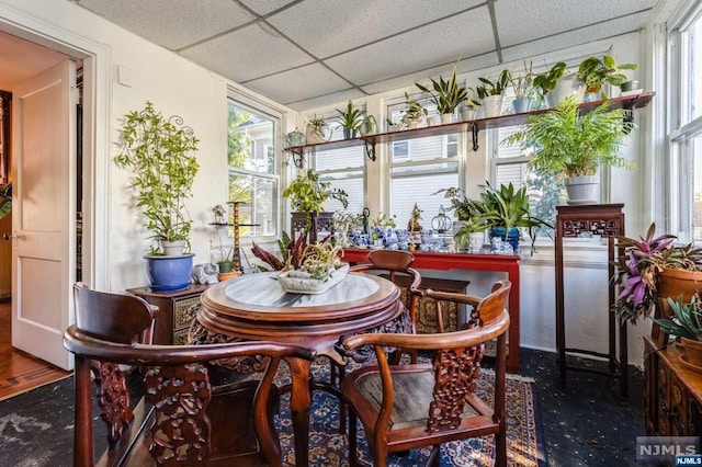 sunroom with a drop ceiling