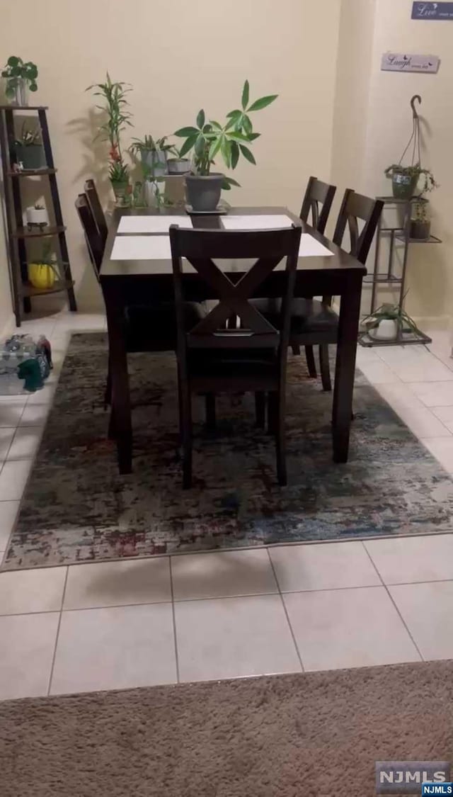 view of tiled dining space