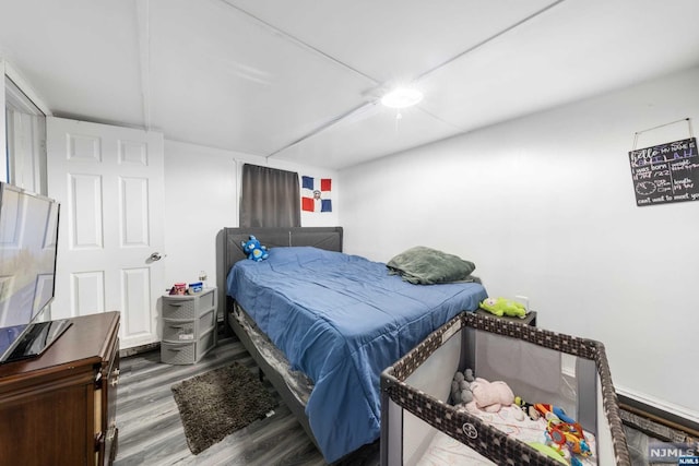 bedroom featuring hardwood / wood-style flooring