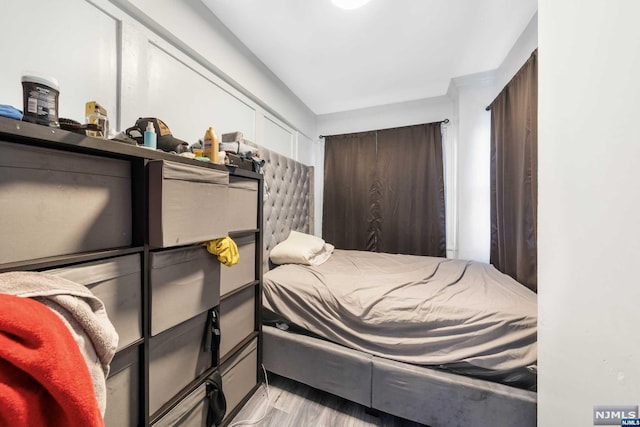 bedroom featuring light hardwood / wood-style floors